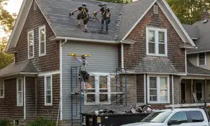 Roof repairs for older homes in Greenville, NC by vinyl siding contractors